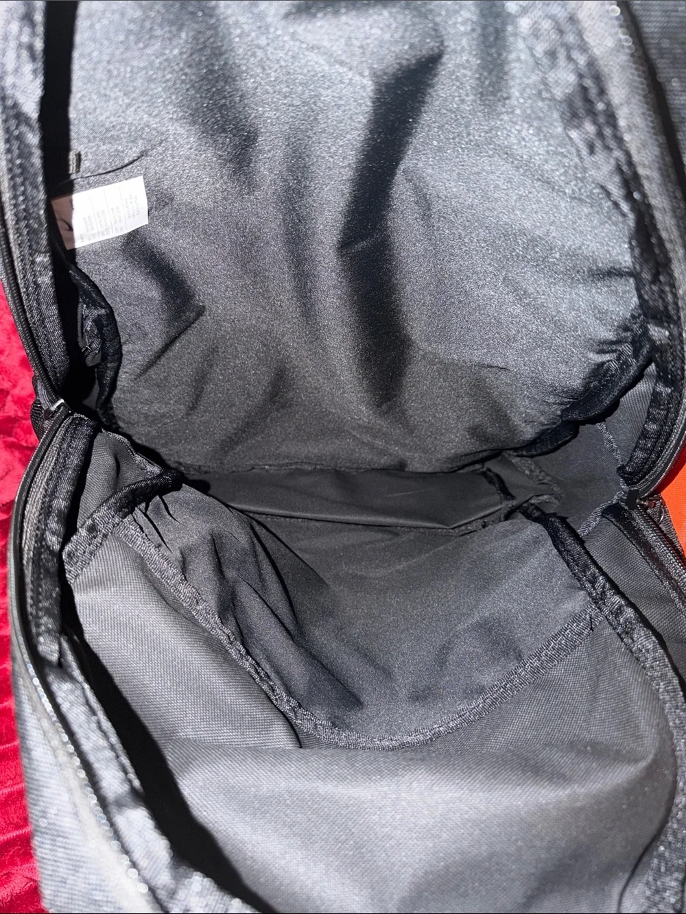 Nike Black Backpack with White Logo and Orange Pouch